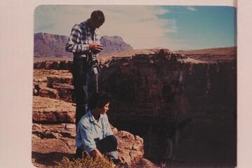 Pat and Susie Reilly look down to Badger Creek Rapid