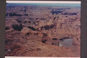 Mouth of Aztec Creek.  The canyon of Toh Dilth Ylth is right of center.  Crack at upper right is at 73.  Approximate gauge:  31,000 cfs