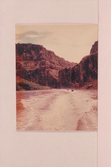 Two of the boats of the Marston fleet cruising in the Grand Canyon