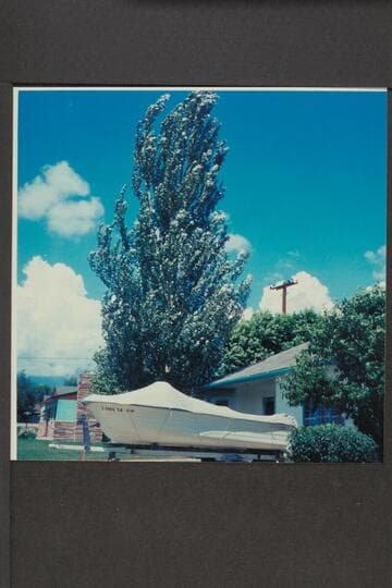 Harvey Butchart's motorboat in front of his home in Flagstaff
