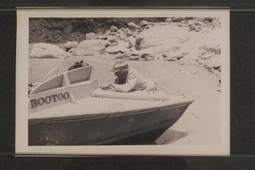 Dock Marston fastening the forward hatch, Mile 24 1/2
