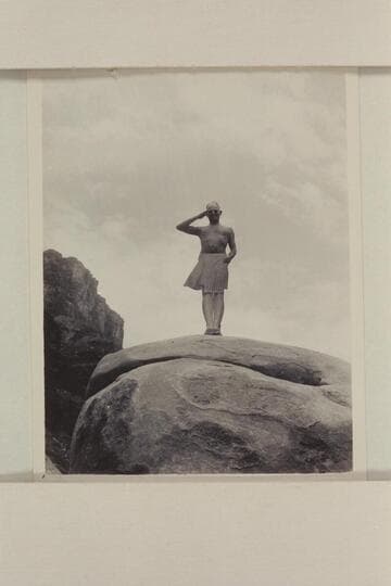 Neill Wilson posing with part of a cardboard figure