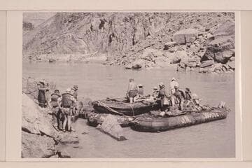 The "Queen Mary" of the Georgie White fleet.  Three pontoons tied together and a 10-man neoprene tied on top of the middle unit