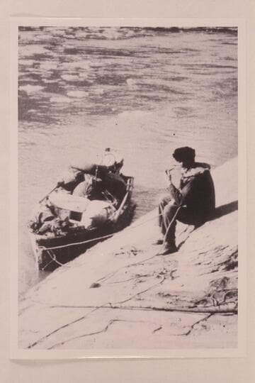 John Wetherill and the overloaded outboard skiff in Glen Canyon