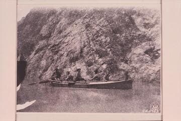 The "Bonnie Jean" below Crystal Creek.  Stanton in the bow; Kane as bow oarsman; Ballard sittiing on the deck amidships, Gibson as stroke and Hogue as sweep