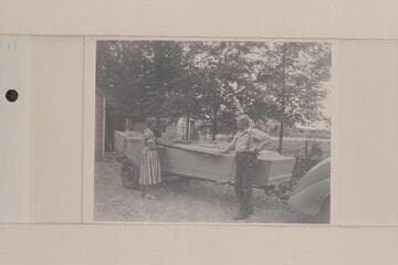 Margaret Marston and Bert Loper with Loper's boat "Grand Canyon" at Loper's home in Green river, Utah, just prior to his leaving for his fatal trip into the Grand Canyon