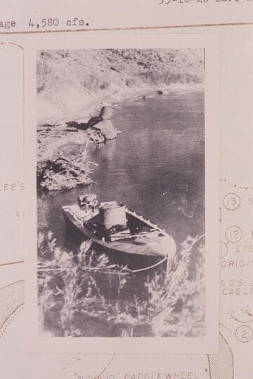Outboard motorboat "Mallard" and the boiler of the steamer "Charles H. Spencer"; Lees Ferry