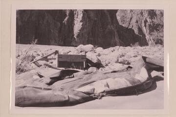 Bus Hatch's boloney left at Bright Angel Creek in 1957 after running from Lees Ferry to Bright Angel in the search for Billingsley.  The crude gear in the background is the rig to support the outboard motor