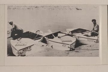 Norm Nevills and Gene Atkinson with the first of Nevill's sadiron shaped Cataract Boats