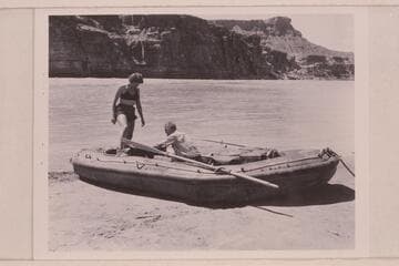 Georgie White and Elgin Pierce in some last minute adjustments before the start of the Grand Canyon traverse.  Paria Riffle