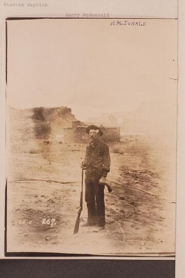 Harry McDonald.  Behind the fort at Lees Ferry.  Stanton caption:  Harry McDonald, A Combination of Trapper, Hunter, Miner and Experienced Boatman."