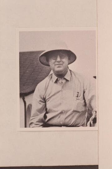 Ed Hudson staring camera down in Paso Robles at time of trip in "Esmeralda" from Boulder Dam to Needles in 1941, March