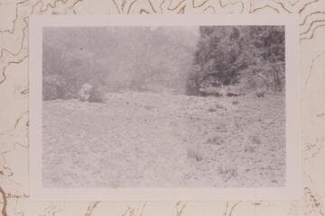 Mescal pit on Shiva Saddle. Backpack at left gives scale