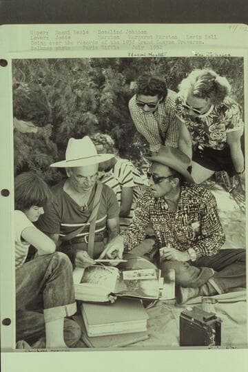 Going over the records of the 1938 Grand Canyon Traverse. Upper: Naomi Heale and Rosalind Johnson; lower: Jodie, Marston, Margaret Marston and Lorin Bell