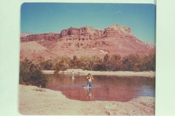 Wading Paria Creek with the water backed up from the river. Lees Ferry gauge: 103,700 cfs