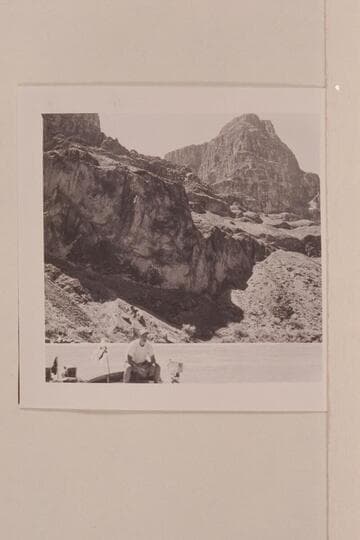 The lava flow into the canyon at Mile 185.5 from left bank. Ed I'Anson worries about his film that got wet
